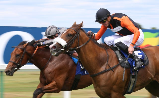 Raasel (right) winning the Coral Charge