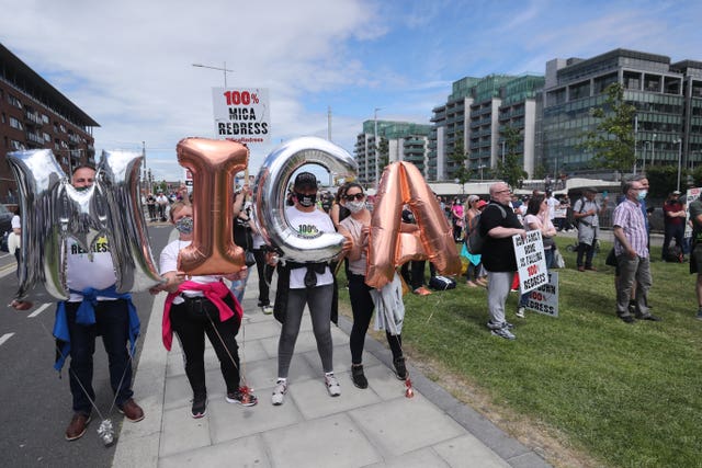Protesters during a demonstration in Dublin to demand a 100% redress scheme for homes and properties affected by bricks contaminated with mica