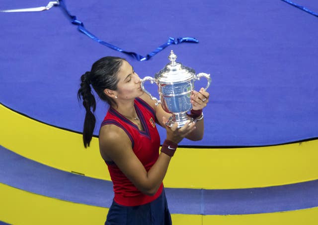 Great Britain’s Emma Raducanu kisses the trophy after winning the US Open women’s singles final