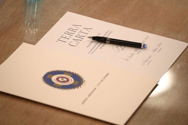 A signed copy of The Prince of Wales’ Terra Carta in the City Council Chamber at Athens City Hall (Chris Jackson/PA)