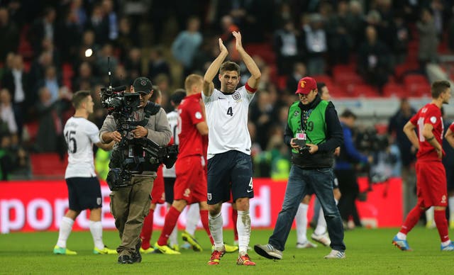 Steven Gerrard celebrates after firing England to Brazil