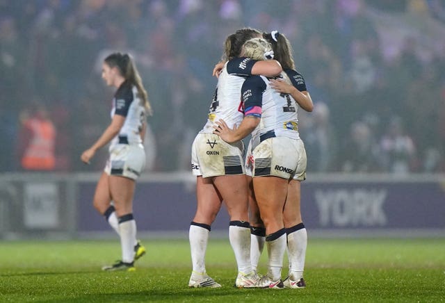 England players console each other after their semi-final defeat