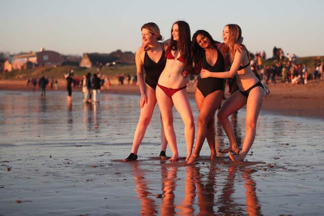Friends mark May Day on East Sands in Fife (Jane Barlow/PA)