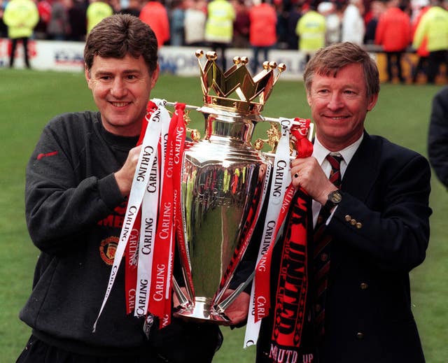 Sir Alex Ferguson and Brian Kidd celebrated winning their first Premier League trophy in style