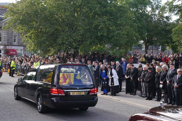 Well-wishers lined the streets as the hearse passed through Ballater, the closest village to Balmoral, on its journey to Edinburgh