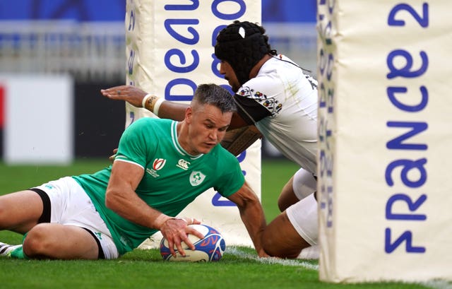 Johnny Sexton claimed two of Ireland's 12 tries