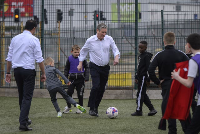 Sir Keir Starmer demonstrates his football skills during a campaign visit to Glasgow 