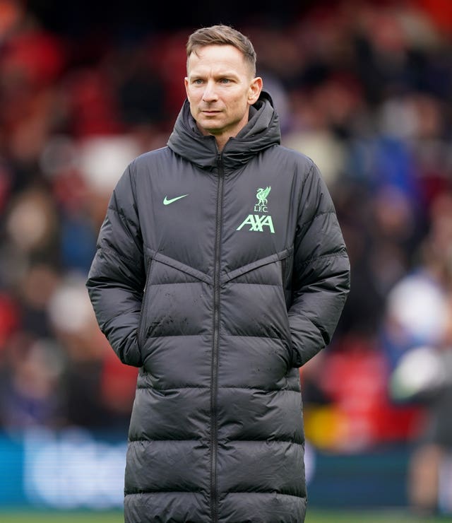 Pepijn Lijnders standing on the touchline