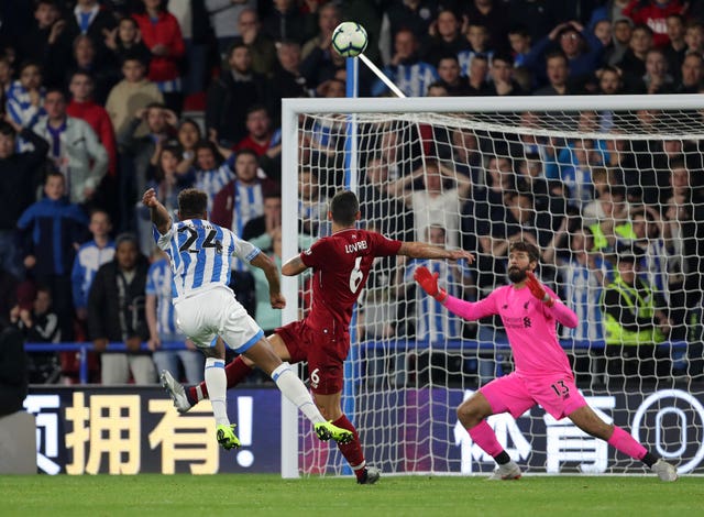 Steve Mounie shoots over the crossbar for Huddersfield (Richard Sellers/PA).