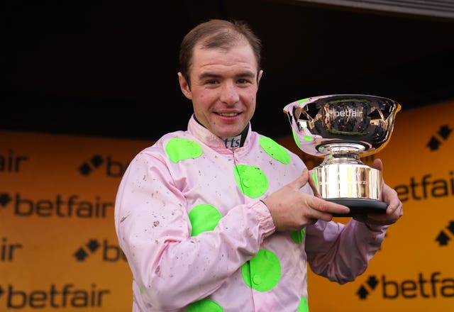 Charlie Deutsch with the Betfair Chase trophy 