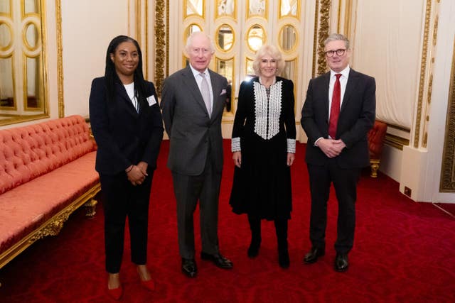 The King and Queen with Conservative Party leader Kemi Badenoch, left, and Prime Minister Sir Keir Starmer, right, during a reception at Buckingham Palace