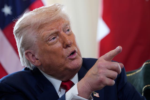 US President Donald Trump pointing