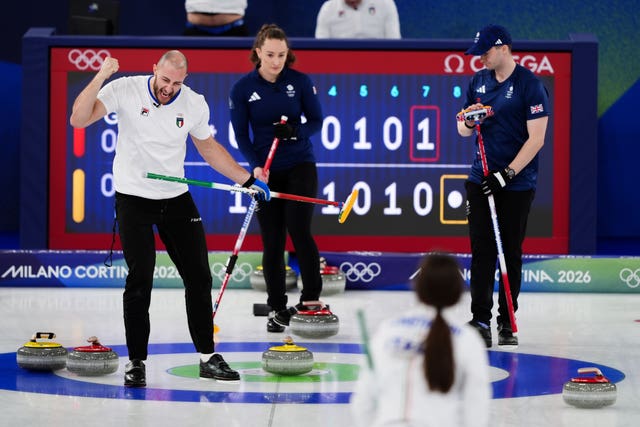 Italy’s Amos Mosaner and Stefania Constantini celebrate victory over Great Britain’s Bruce Mouat and Jennifer Dodds 