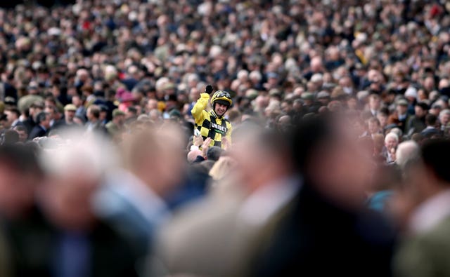Nico De Boinville celebrates following victory in the the Sky Bet Supreme Novices' Hurdle aboard Shishkin on day one of the Cheltenham Festival in March.The festival, which attracted around 150,000 people, was among the final large sporting events to be held before lockdown measures were introduced.