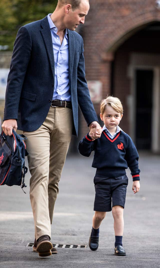 Prince George and his father the Duke of Cambridge on his first day at school at Thomas's Battersea (Richard Pohle/The Times/PA)