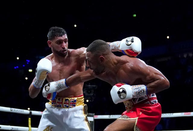 Amir Khan (left) in action against Kell Brook in February (Nick Potts/PA).