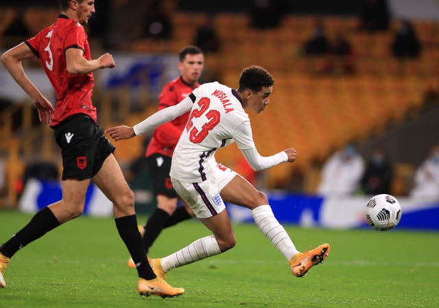 Jamal Musiala, right, scores in an England Under-21 game against Albania