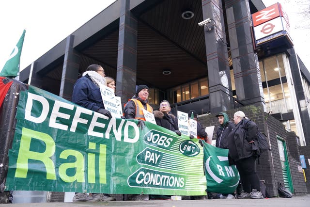 Members of the Rail, Maritime and Transport union on the picket line