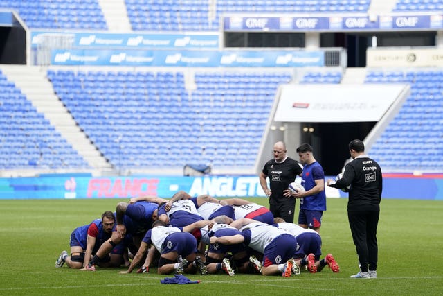 France players practice a scrum during the team run a