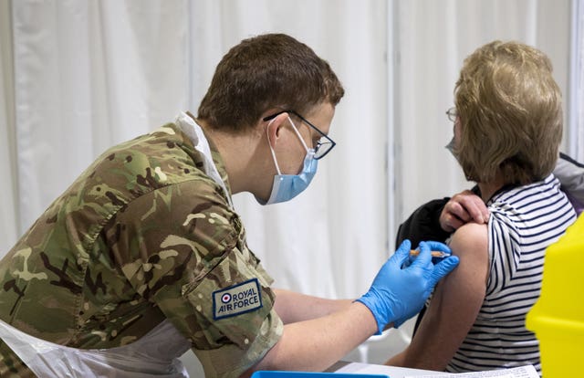 A member of the Royal Air Force giving a Covid-19 vaccination (SAC Sam Dale RAF/PA)