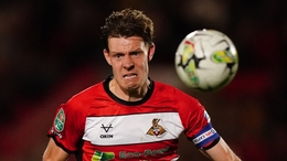 Joe Ironside was on the scoresheet as 10-man Doncaster sealed their place in the play-offs with a draw at Gillingham (Mike Egerton/PA)