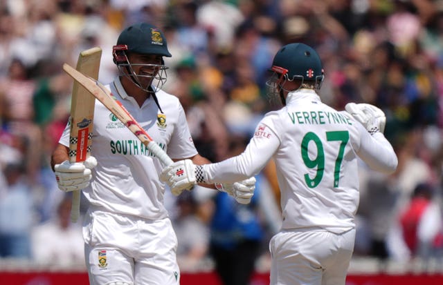 South Africa's Kyle Verreynne, right, celebrates with team-mate David Bedingham after hitting the winning runs at Lord's