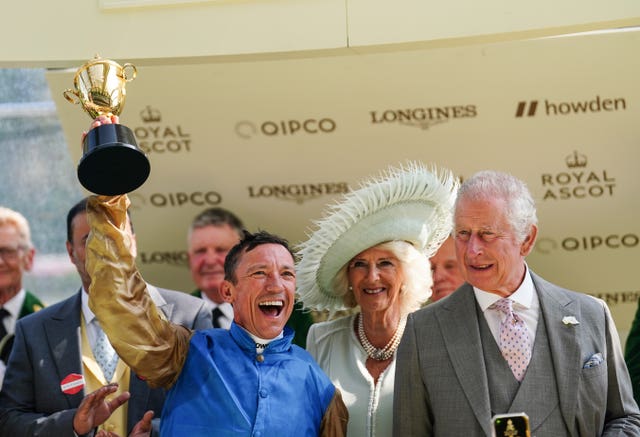 Frankie Dettori celebrates Gold Cup glory alongside the King and Queen
