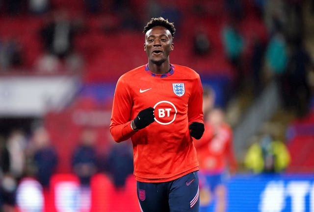 England’s Tammy Abraham warms up before the FIFA World Cup Qualifying match at Wembley Stadium, London. 