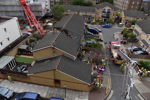 The scene in Bow, east London, where a 20-metre crane has collapsed on to a house (Dominic Lipinski/PA)