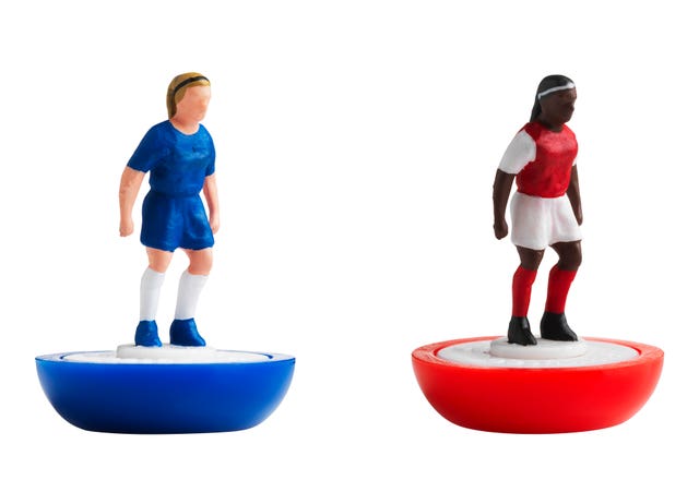 Figures are painted in the colours of Chelsea and Arsenal (FA/PA)