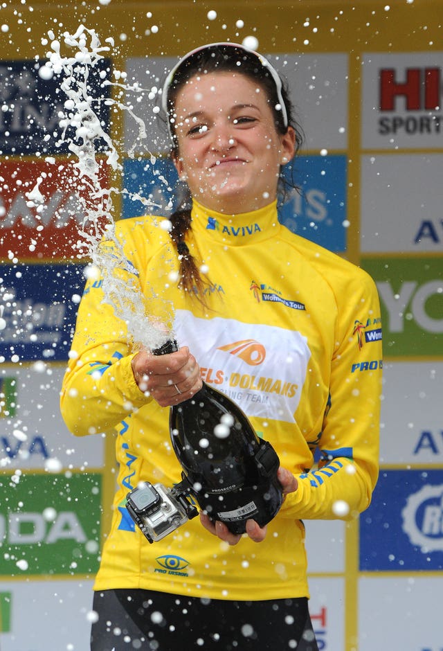 Lizzie Deignan, at the time known as Lizzie Armitstead, sprays champagne on the podium after winning the 2016 Tour of Britain