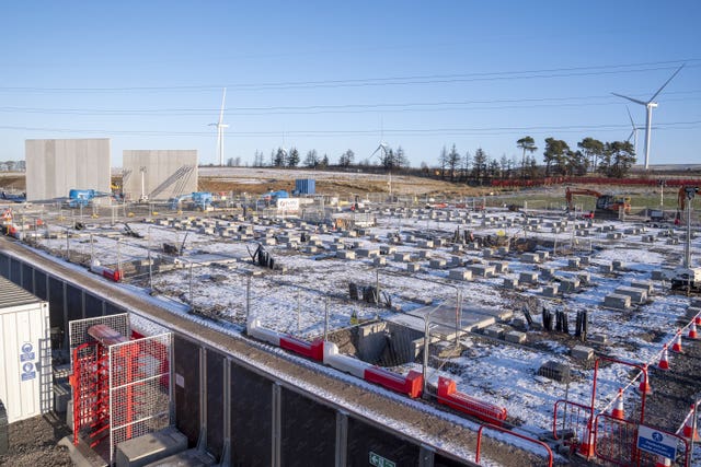 View of an under construction battery storage site, under blue skies