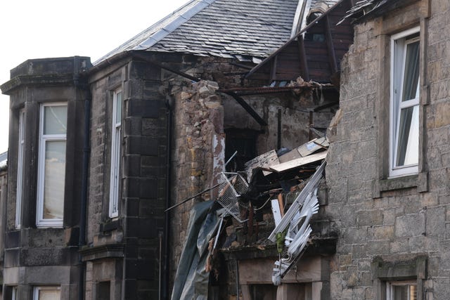 A block of flats with the roof caved in after an explosion in Alloa