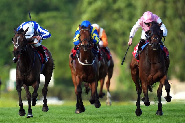 Sweet William, right, beats Caius Chorister, left, by a head in the Chasemore Farm Henry II Stakes at Sandown