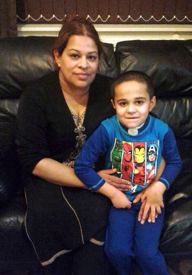 Ayman Faisal with his mother Sair