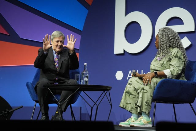 Sir Stephen Fry and Dr Anne-Marie Imafidon on stage