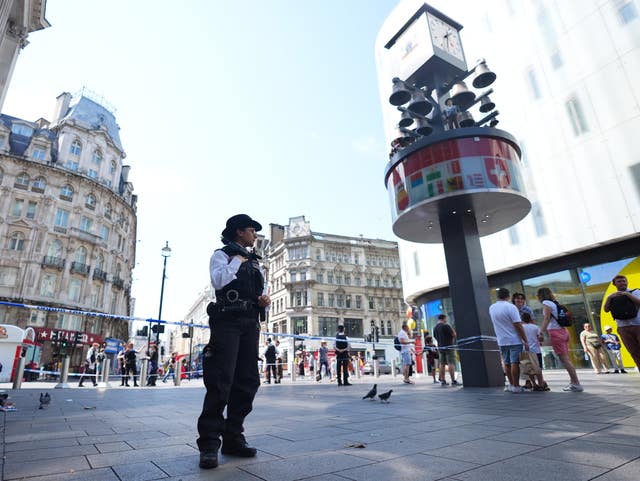 Police officers at the scene in Leicester Square