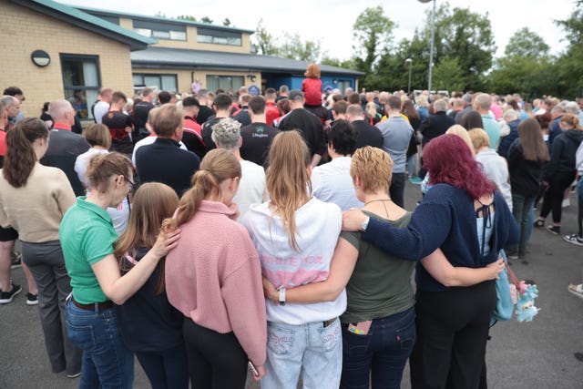 People attending a vigil for shooting victims in Co Fermanagh