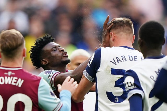 West Ham’s Mohammed Kudus raises his hands to Micky van de Ven's face and received a red card after a VAR check