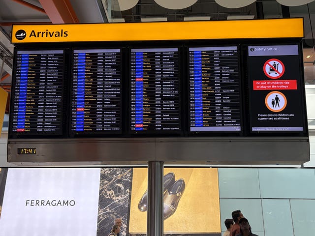 An arrivals board at Terminal 5 Heathrow, after flights were cancelled on Tuesday because of a UK air traffic control issue