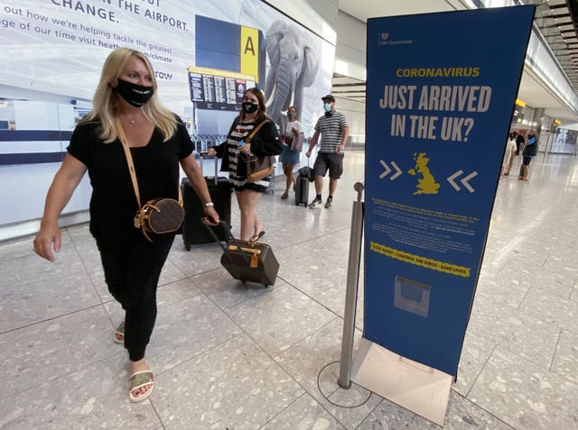 Passengers arrive at Heathrow Airport