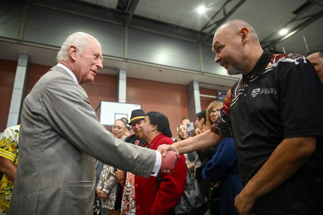 The King meeting members of the Indigenous community in Australia