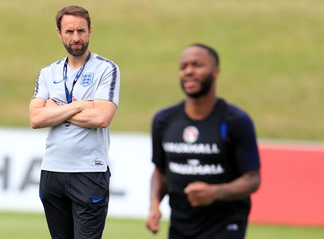 Southgate watches Sterling during training 