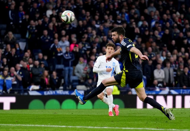 Konstantinos Karetsas curls home Greece's second goal