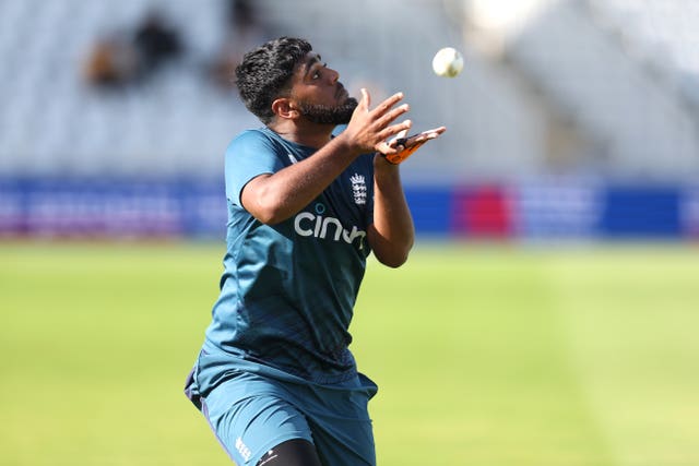 Rehan Ahmed takes a catch during an England training session.