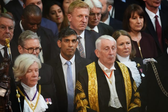 Prime Minister Sir Keir Starmer, former prime Minister Rishi Sunak and Speaker of the House of Commons Sir Lindsay Hoyle listening to the King’s Speech during the State Opening of Parliament in chamber of the House of Lords 