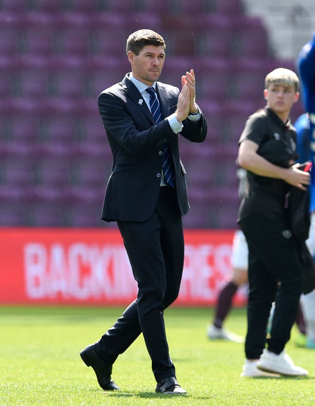 Rangers manager Steven Gerrard applauds the fans after his side's victory