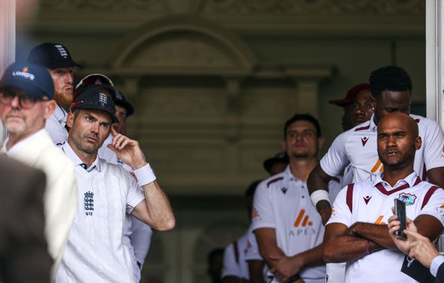 James Anderson, left, waits to walk out onto the field of play at Lord's