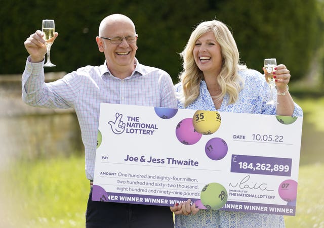 Joe Thwaite, 49, and Jess Thwaite, 46, from Gloucestershire won a record-breaking EuroMillions jackpot in May 2022 (Andrew Matthews/PA)