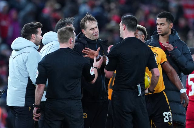 Wolves manager Julen Lopetegui speaks with referee Andrew Madley after the 2-2 draw at Liverpool (Peter Byrne/PA).